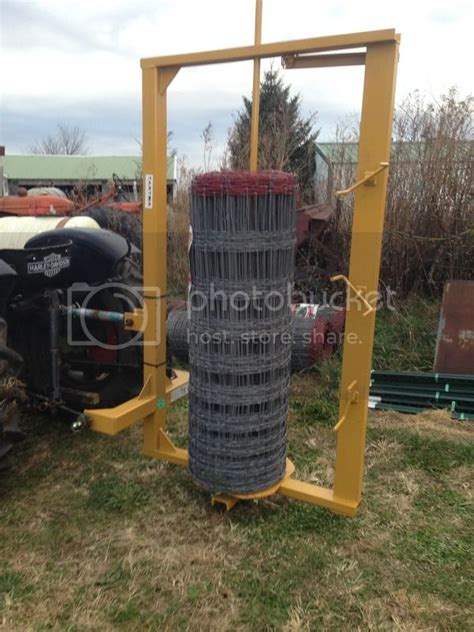 woven wire fence unroller for skid steer|fence skid steer attachments.